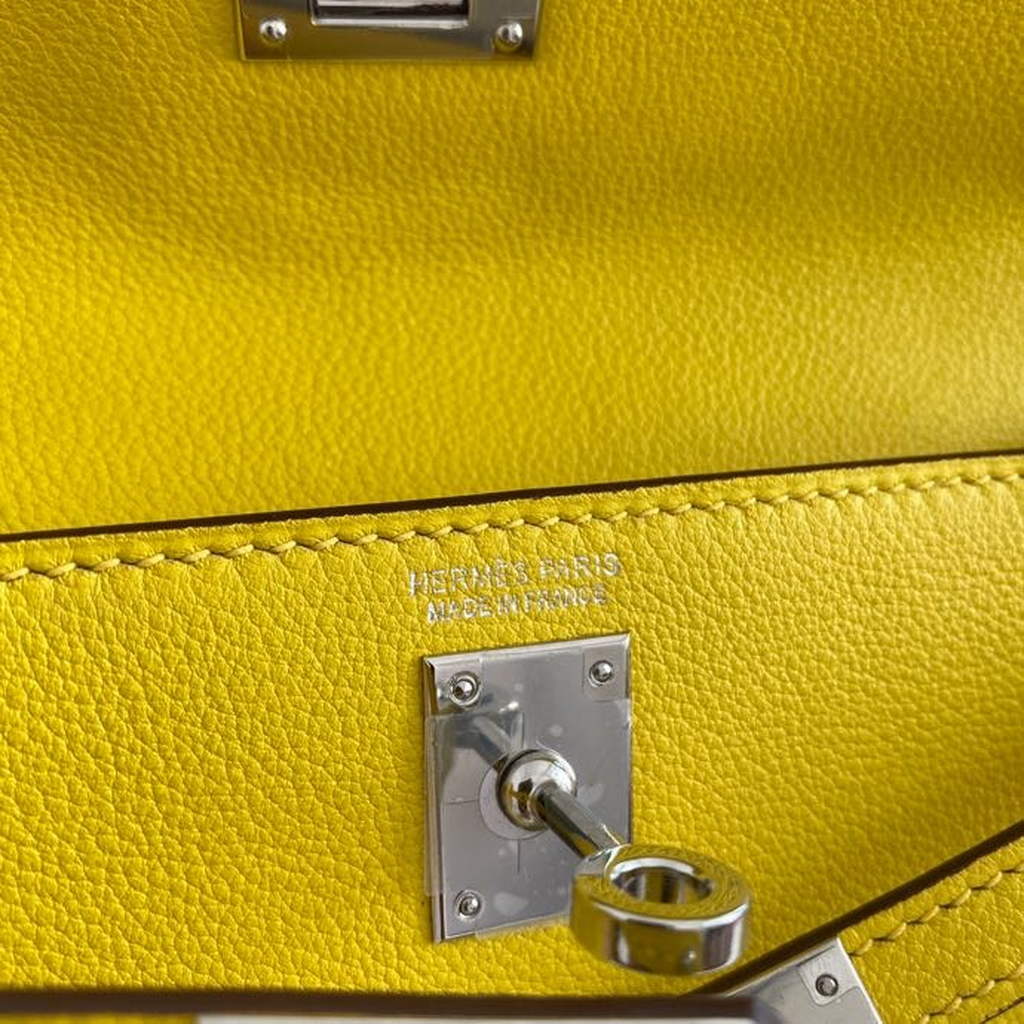 Hermès Kelly Danse II lemon yellow Evercolor leather with silver