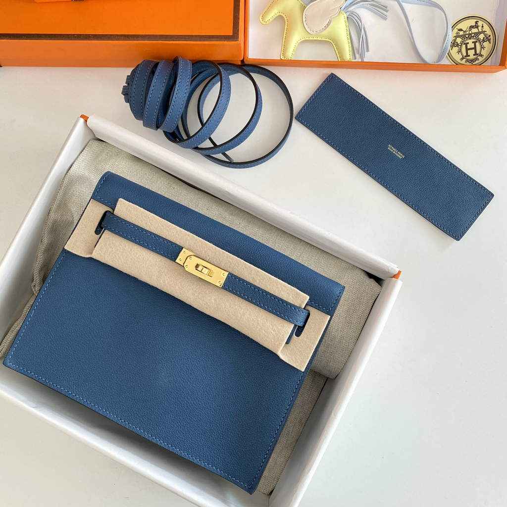Hermès Kelly Danse II dark blue Evercolor leather with gold
