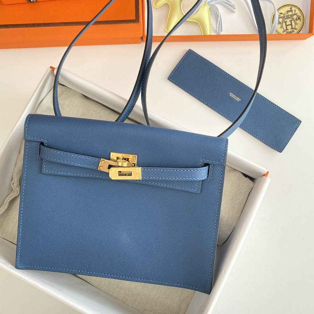 Hermès Kelly Danse II dark blue Evercolor leather with gold