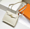 Hermès Kelly Danse II beige Evercolor leather with gold