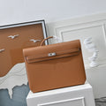 Dark Togo leather vs bright white contrast stitching on Herm¨¨s Kelly D¨¦p¨ºche 36 ¨C saddle stitch detail
