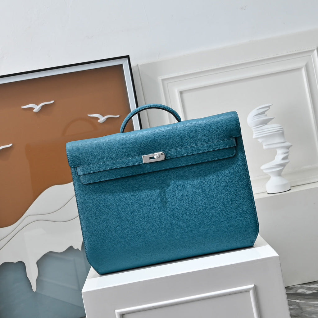 Authentic Herm¨¨s Kelly D¨¦p¨ºche 36 hand-stitched Togo calfskin ¨C noir, silver hardware, 2023 stamp