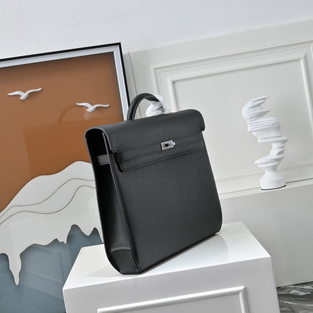 Hermès Kelly Dépêche 36 â€?Hand-stitched Togo Calfskin in Black