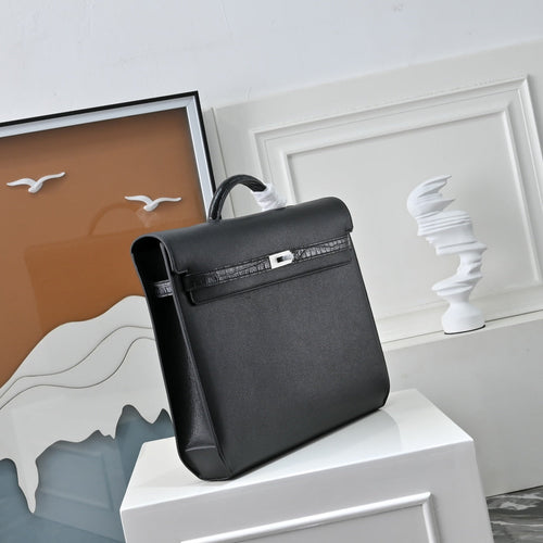 Black & Togo. The Hermès Kelly Dépêche 36. Forever classic
