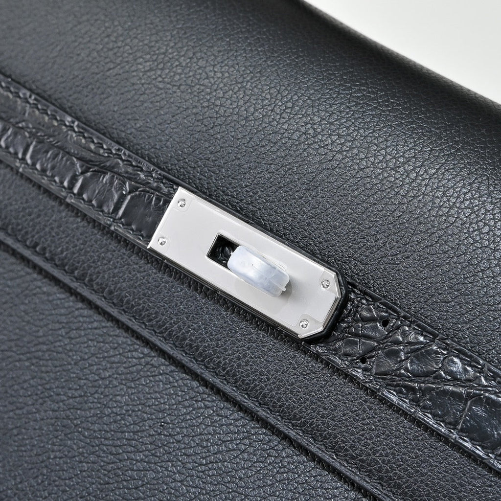 Black & Togo. The Hermès Kelly Dépêche 36. Forever classic