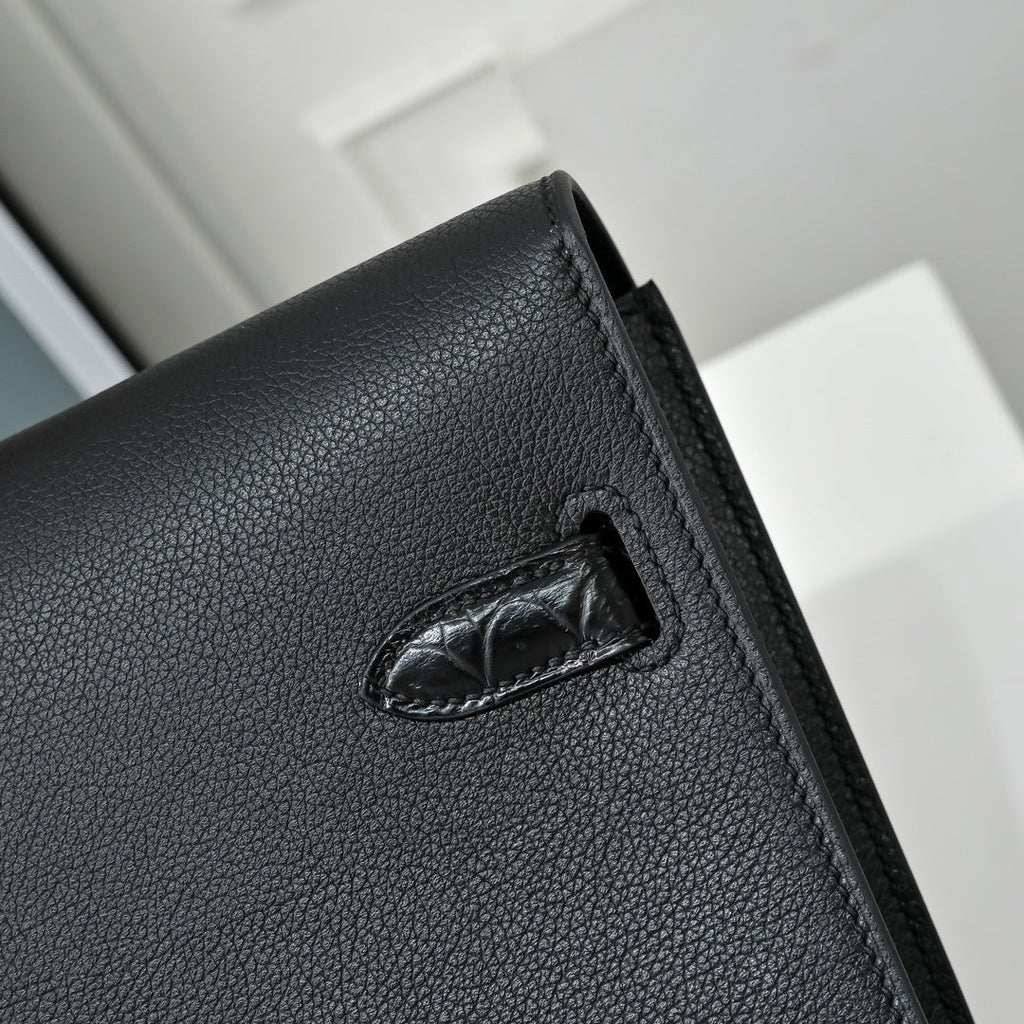 Black & Togo. The Hermès Kelly Dépêche 36. Forever classic