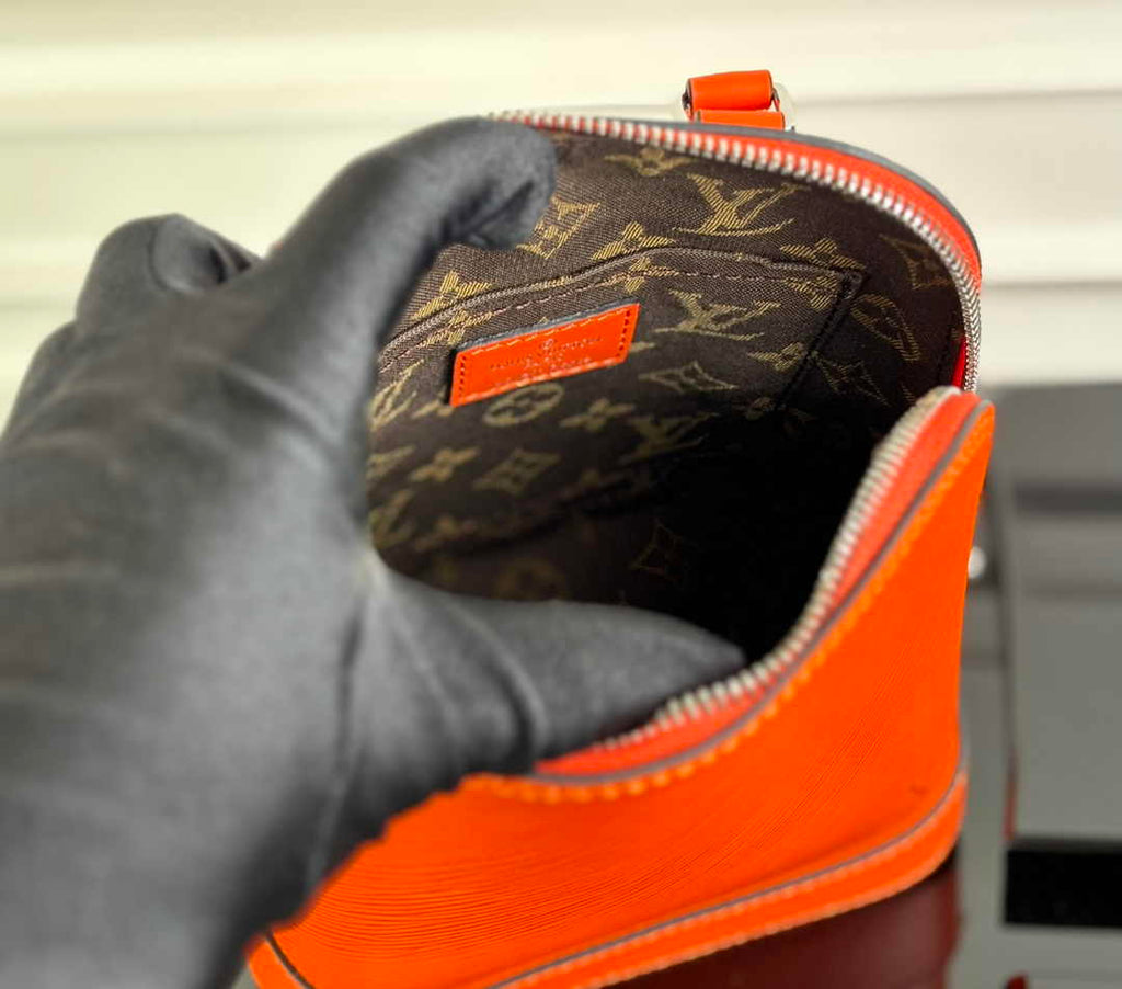 Louis Vuitton Alma Backpack M25104 Orange Epi grained leather