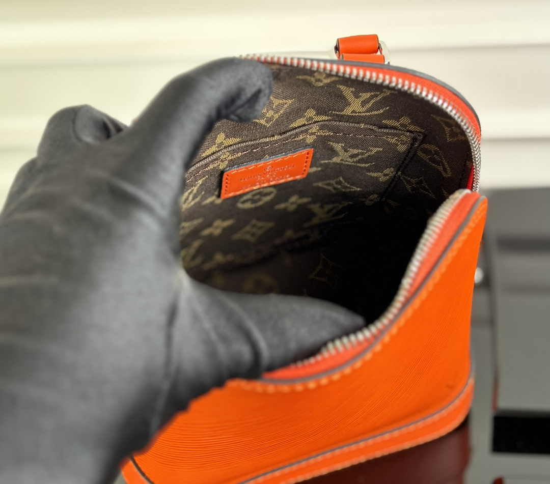 Louis Vuitton Alma Backpack M25104 Orange Epi grained leather