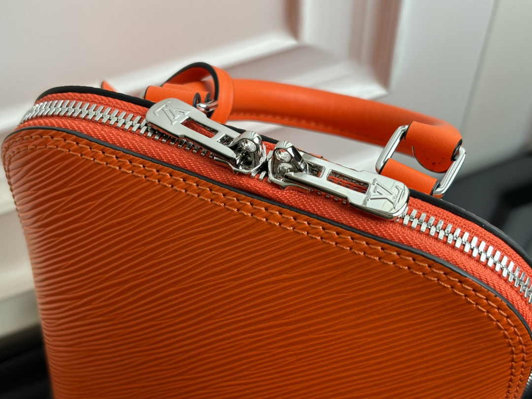 Louis Vuitton Alma Backpack M25104 Orange Epi grained leather