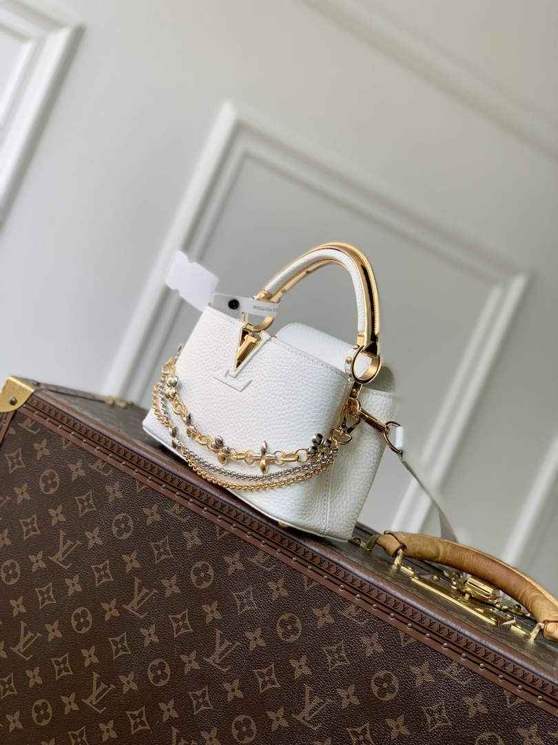 Louis Vuitton Capucines East-West Mini, M26345 In White Taurillon Leather