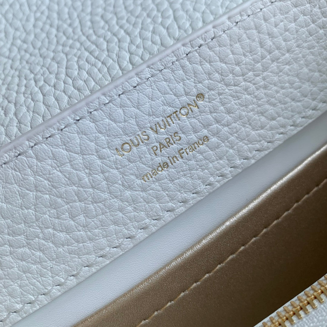 Louis Vuitton Capucines East-West Mini, M26345 In White Taurillon Leather