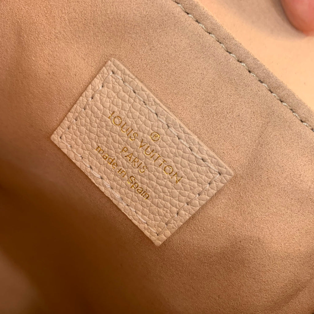 Louis Vuitton LV M81351 Tiny Backpack Monogram Empreinte Leather