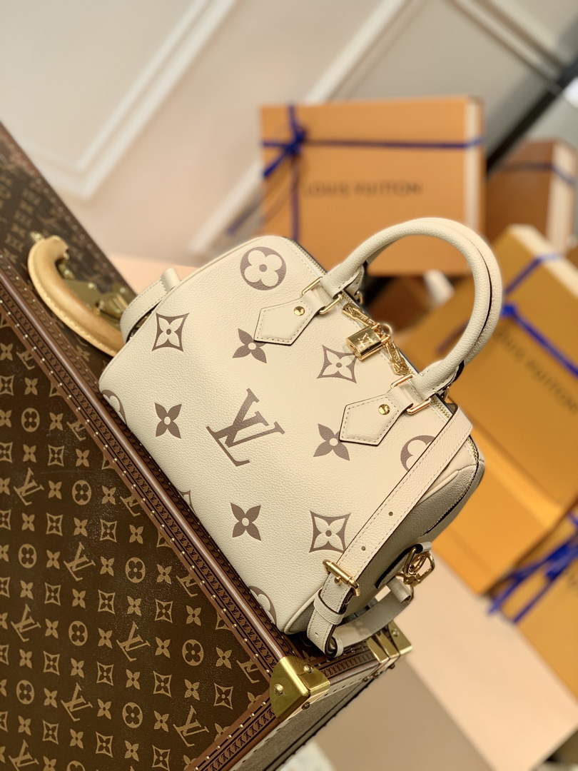 Louis Vuitton M58947 Speedy Bandoulière 25 white