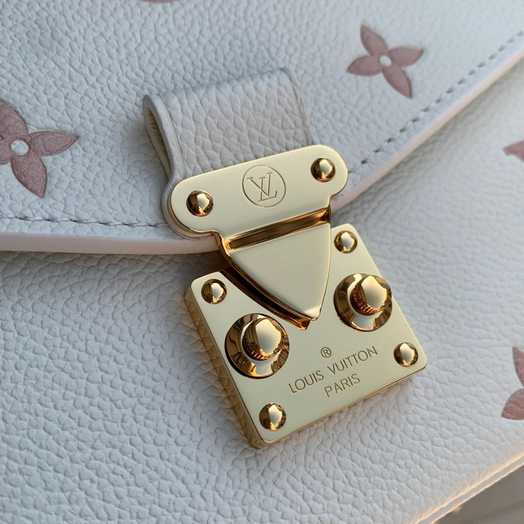 Louis Vuitton Pochette Métis East West M27575