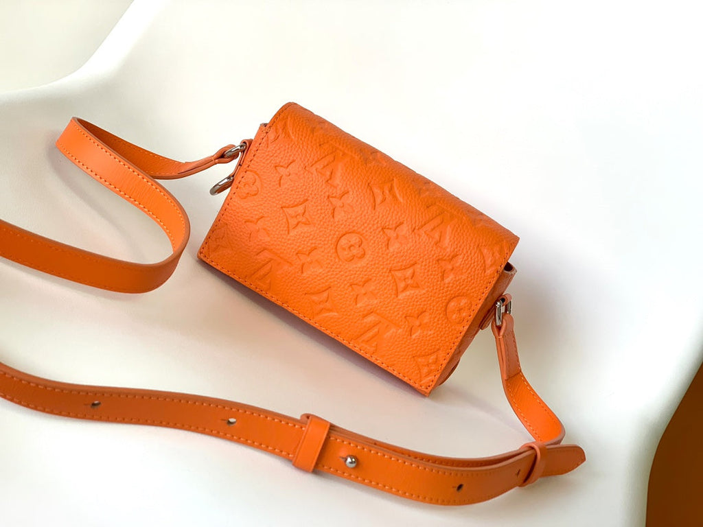 Louis Vuitton Steamer Wearable Wallet M82916 Orange Leather