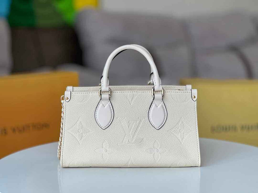 LV M23698 Louis Vuitton OnTheGo East West Monogram Empreinte Leather Cream - Default Title - View 2
