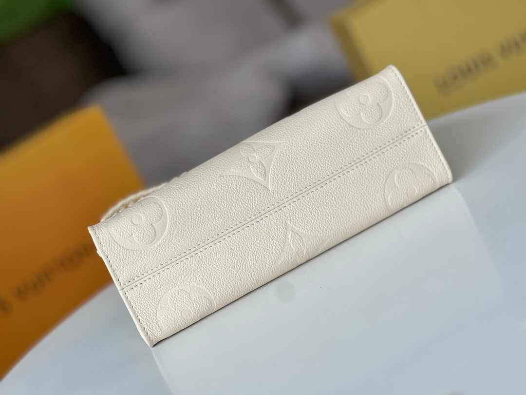 LV M23698 Louis Vuitton OnTheGo East West Monogram Empreinte Leather Cream - Default Title - View 5