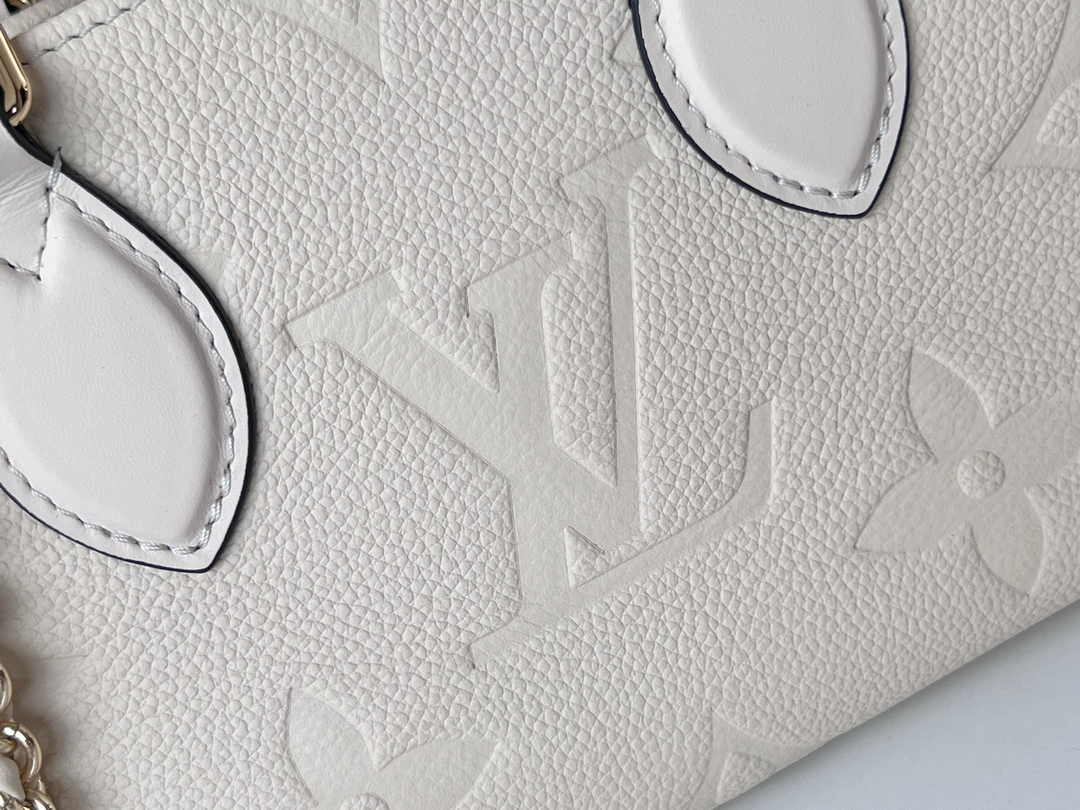 LV M23698 Louis Vuitton OnTheGo East West Monogram Empreinte Leather Cream - Default Title - View 6