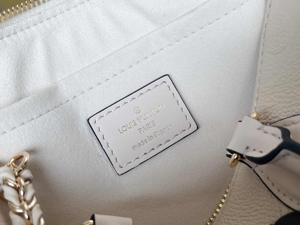 LV M23698 Louis Vuitton OnTheGo East West Monogram Empreinte Leather Cream - Default Title - View 8