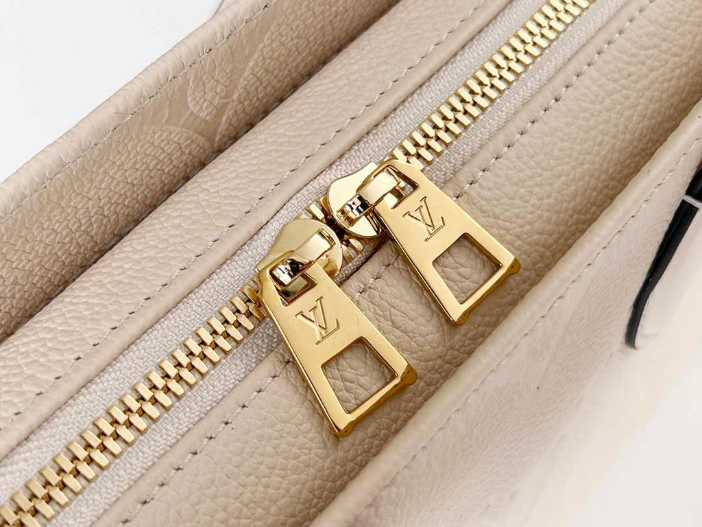 LV M23698 Louis Vuitton OnTheGo East West Monogram Empreinte Leather Cream - Default Title - View 9