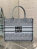 Medium Dior Book Tote M1296 Pale Blue and Black Miss Dior Allover Embroidery - Default Title - View 1