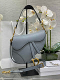36. Dior M0455 Saddle Bag with strap placed in Dior orange gift box