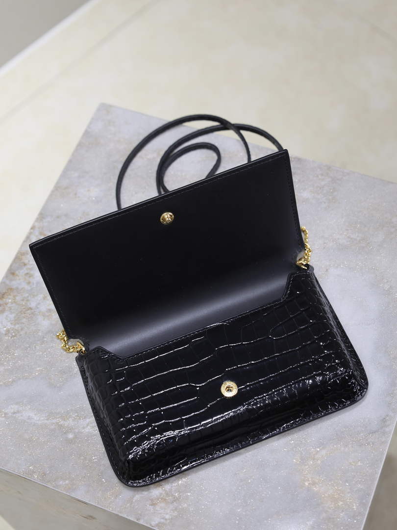 YSL CASSANDRE phone holder 635095 in SHINY crocodile-embossed leather black